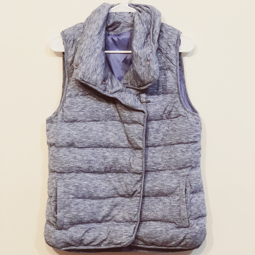 Puffer vest, never worn. Jersey shell